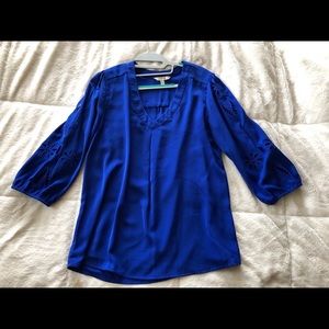 Blue blouse with cutout sleeve detail